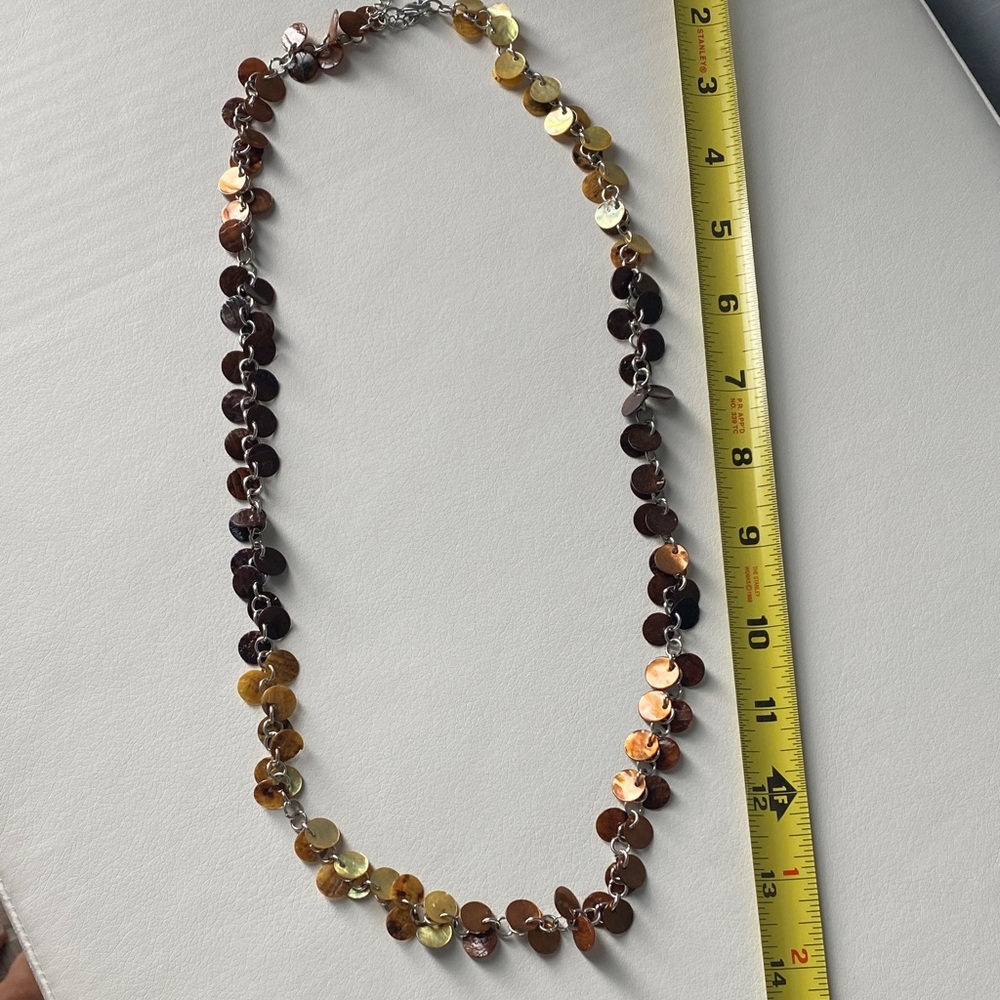 Elegant Gold and Brown Disc Necklace